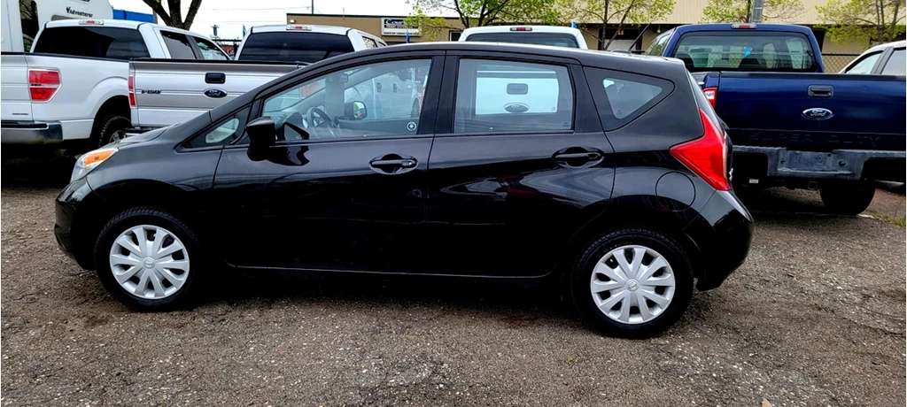 Used 2015 Nissan VERSA SV (# R2114 