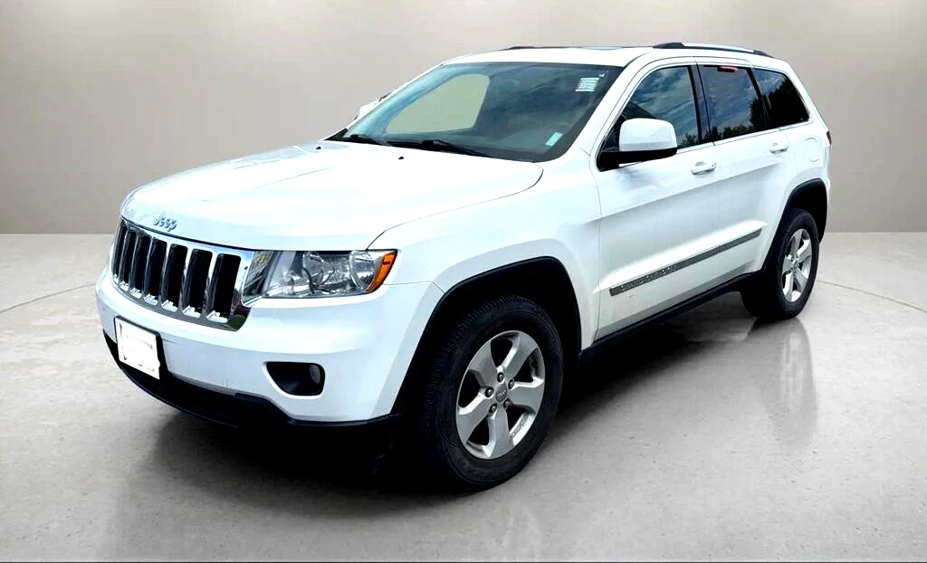 Used 2013 Jeep GRAND CHEROKEE LAREDO 