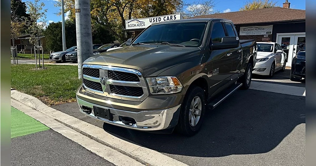 Used 2015 RAM 1500 4WD QUAD CAB 140.5 SLT 4WD Quad Cab 140.5" SLT