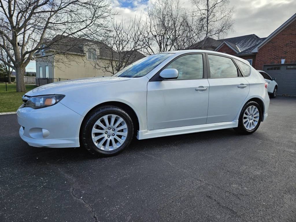 Used 2011 Subaru IMPREZA 4DR MANUAL 2.5I W/TOURING PKG 