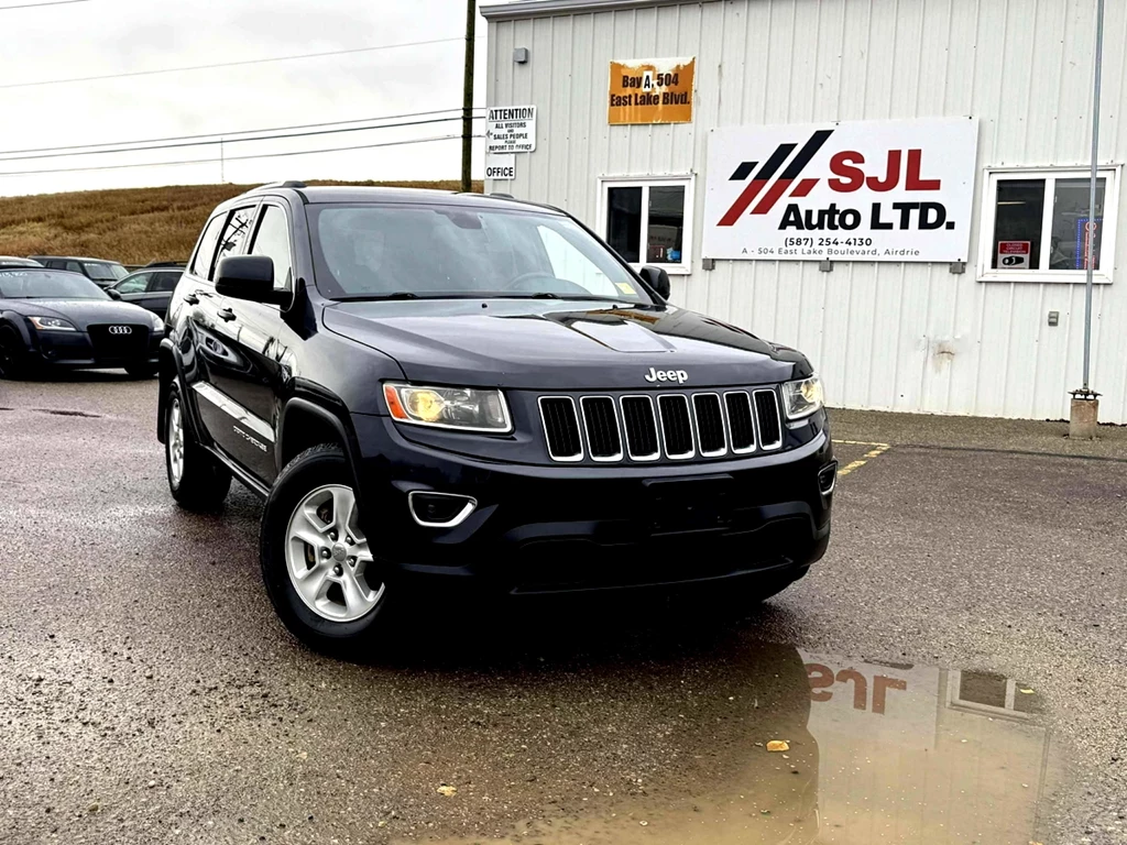 Used 2016 Jeep GRAND CHEROKEE LAREDO 