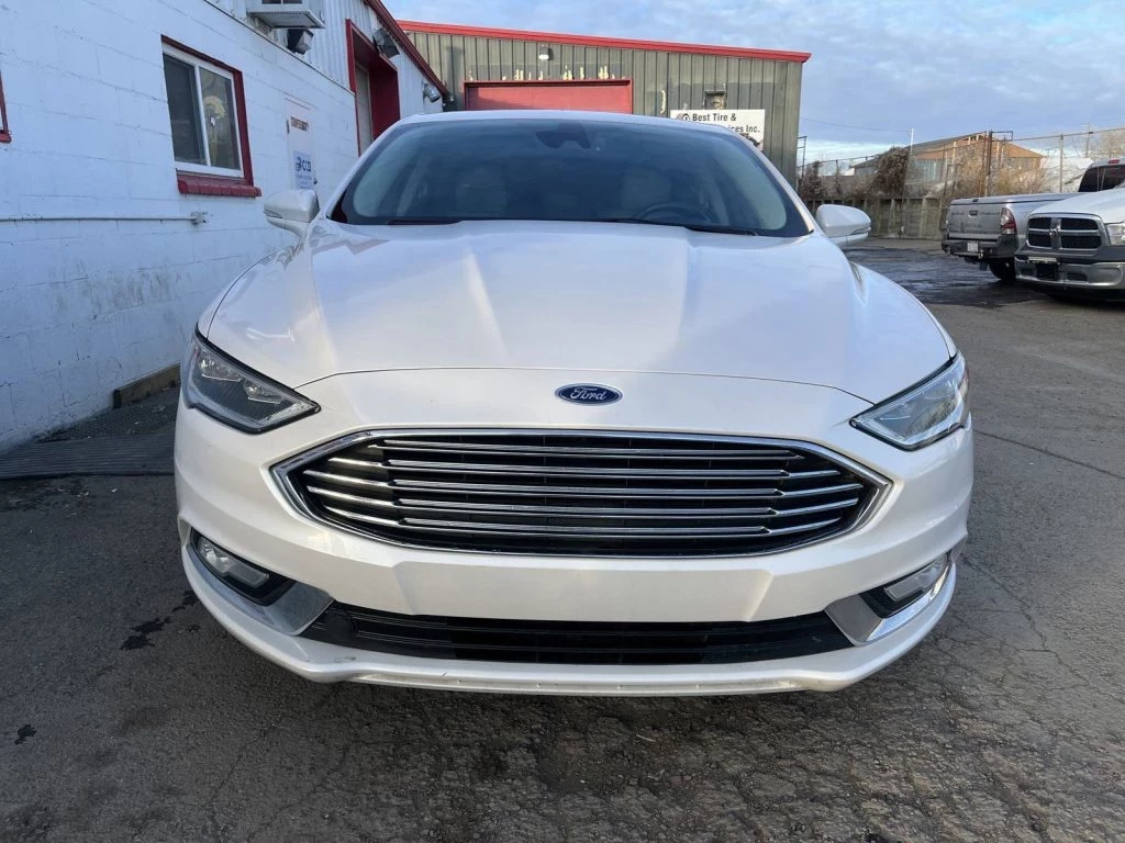 Used 2018 Ford FUSION ENERGI 105405 | 129,507 KM | OXFORD WHITE 